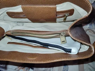 Dos bolsos de mano de piel marrón