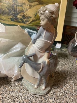 Figura cerámica niña con burro