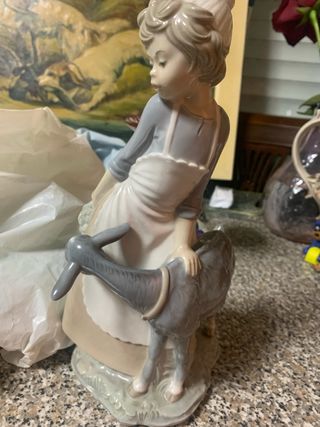 Figura cerámica niña con burro