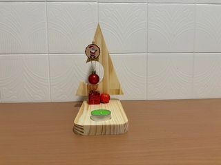 Portacandele in legno con decorazioni