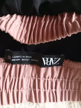 Pantalón deportivo Zara negro y rosa,
