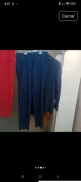 Traje chaqueta y pantalón azul. Di Bye