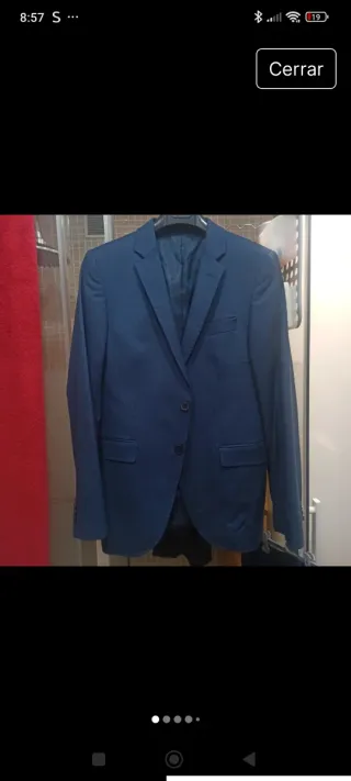 Traje chaqueta y pantalón azul. Di Bye