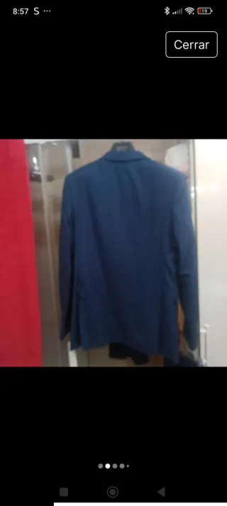 Traje chaqueta y pantalón azul. Di Bye