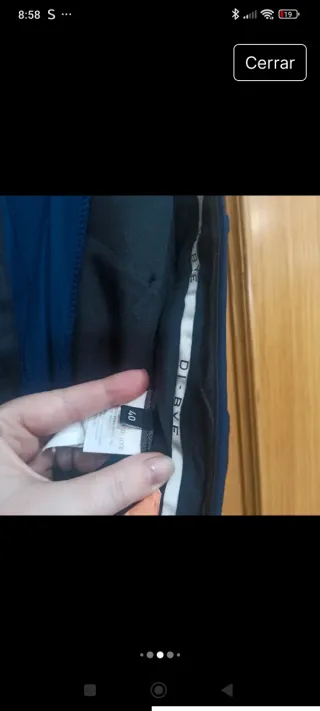 Traje chaqueta y pantalón azul. Di Bye