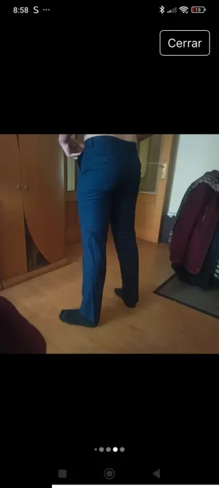 Traje chaqueta y pantalón azul. Di Bye