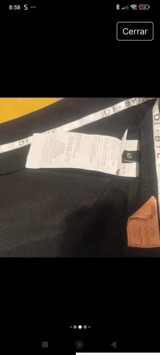 Traje chaqueta y pantalón azul. Di Bye