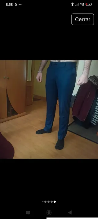 Traje chaqueta y pantalón azul. Di Bye