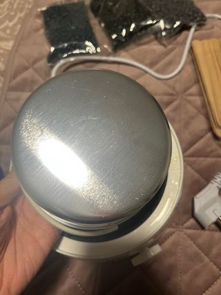 Máquina de cera azul y negra