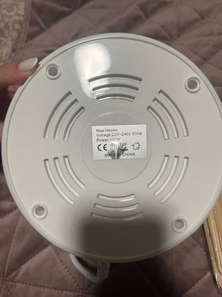 Máquina de cera azul y negra