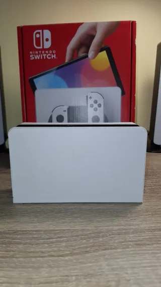 Nintendo Switch OLED Blanca + Fundas de transporte