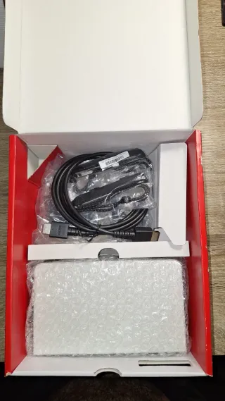 Nintendo Switch OLED Blanca + Fundas de transporte