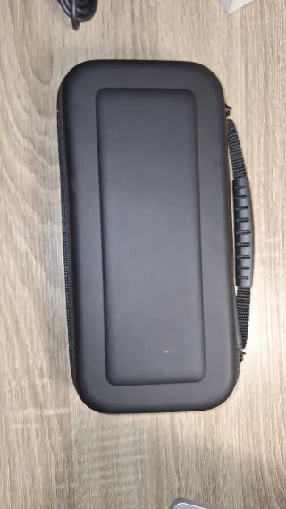 Nintendo Switch OLED Blanca + Fundas de transporte