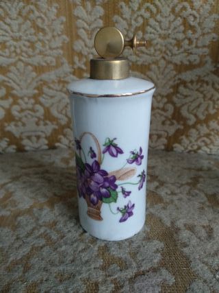 Frasco de esencias decorativo con flores