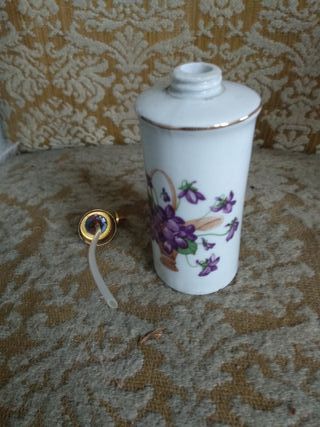 Frasco de esencias decorativo con flores