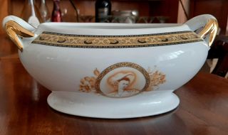 Centrotavola in porcellana con decori oro