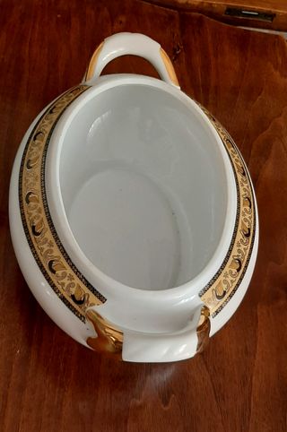 Centrotavola in porcellana con decori oro