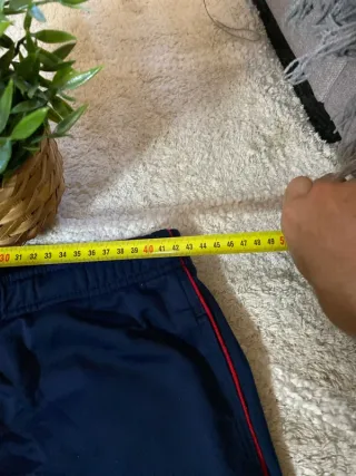 Pantalón de chándal Nike azul marino con detalles