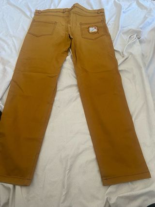 Pantalón color naranja talla 24