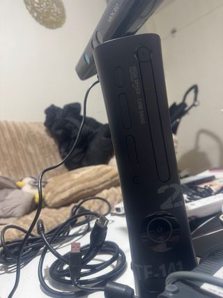 Consolle PS3 e Xbox 360 con videogiochi e accessori