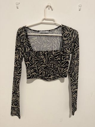 Blusa INSIDE manga larga estampado cebra XS