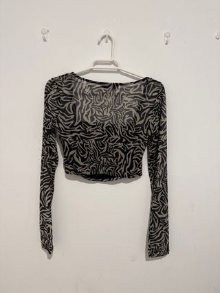 Blusa INSIDE manga larga estampado cebra XS