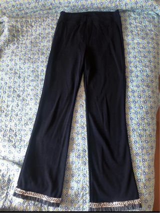 Pantalón azul con flecos