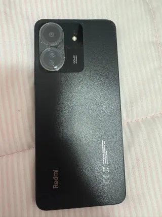 Móvil Negro. Con funda.