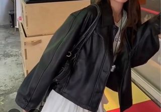 Chaqueta polipiel negra botones XL