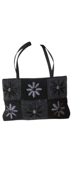 Bolso de fiesta negro con flores