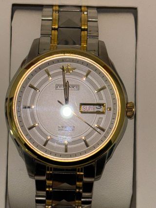 Reloj Oupinke Oro y Plata. Hombre