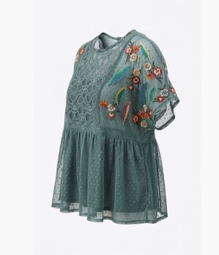 Blusa tul bordada flores y plumas