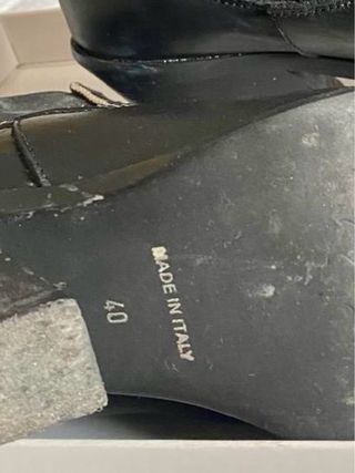 Botines piel negros tachas