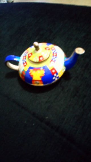 Mini teteras de porcelana decoradas