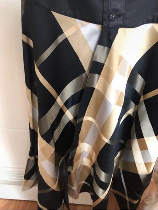 Falda reversible negra y dorada