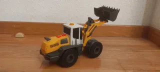 Camión volquete y excavadora de juguete