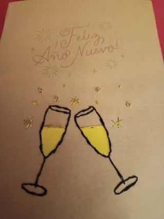 Tarjeta Feliz Año Nuevo bordada a mano