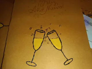 Tarjeta Feliz Año Nuevo bordada a mano