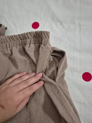 Pantalones anchos de lino beige