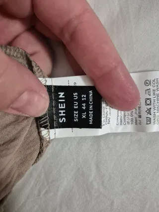 Pantalones anchos de lino beige