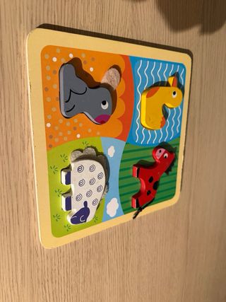 Giocattoli in legno: veicoli e personaggi