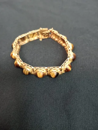 Pulsera de oro con piedras marrones(ojo de tigre)