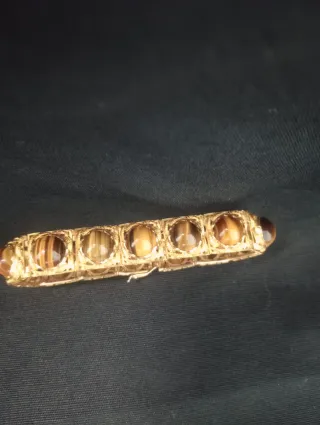 Pulsera de oro con piedras marrones(ojo de tigre)