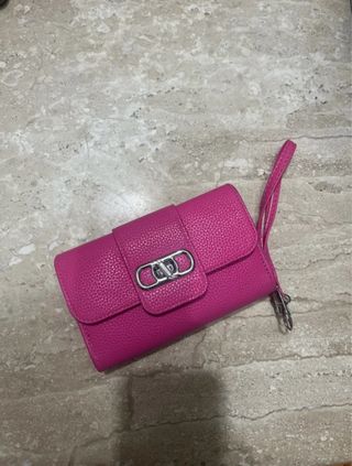 Portafoglio fucsia con tracolla