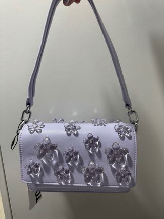 Bolso Tous malva con flores