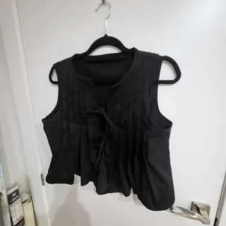 Blusa negra moderna con lazos Talla L