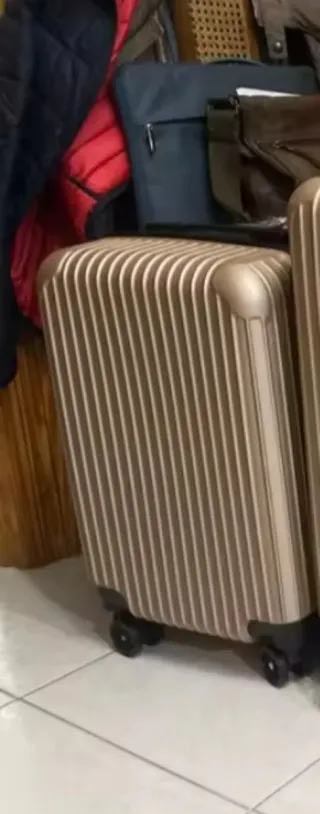 Maleta de cabina dorada