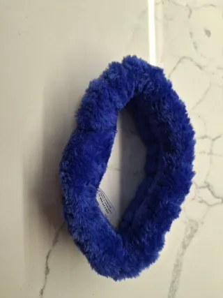 Pochette Estée Lauder con fasce skincare