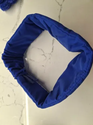 Pochette Estée Lauder con fasce skincare