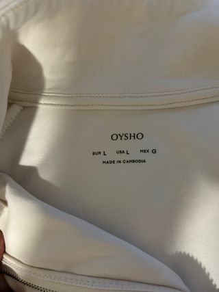 Chaqueta deportiva blanca con rayas